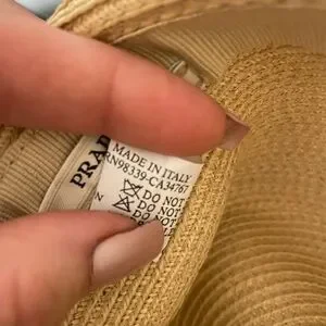 Prada Tan Bucket Hat Woven Sun Protection Logo cotton bucket hat in beige - Prada | Mytheresa main image 4